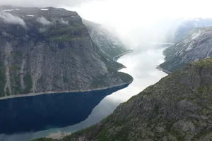 Trolltunga With Thick White Fog Wallpaper