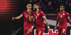 Tunisia National Football Team Players On Football Field Wallpaper