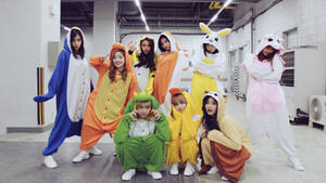 Twice 4k Wearing Animal Onesies Wallpaper