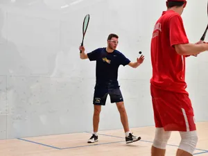 Two Boys In Squash Room Wallpaper
