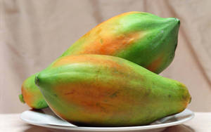 Two Fresh Papaya Fruits Wallpaper