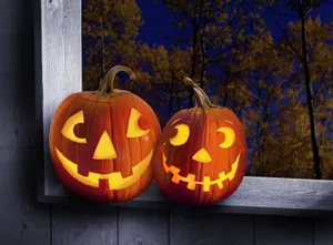 Two Halloween Pumpkins On Wooden Window Wallpaper