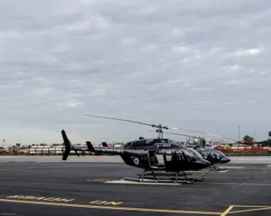 Two Helicopters Parked Wallpaper