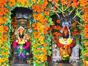 Two Lord Pandurang Statues At Temple Wallpaper