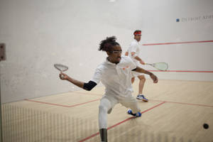 Two Men Exceptional Racquetball Play Wallpaper