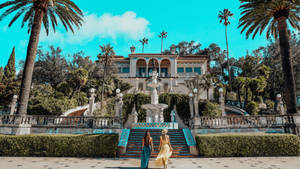 Two Women Entering The Hearst Castle Wallpaper