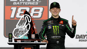 Ty Gibbs Proudly Displaying His Racing Trophy Wallpaper