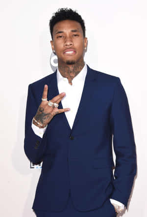 Tyga Performing Live On Stage Wallpaper