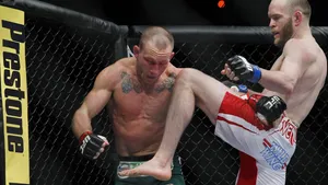 Ufc 160 Gray Maynard Kneed By T.j. Grant By Wallpaper