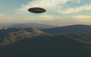 Ufo Flying Over Mountains Wallpaper