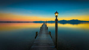 Ultra Hd Pier During Sunset Laptop Wallpaper