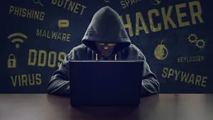 Unidentified Digital Hacker Working With Their Custom Setup. Wallpaper