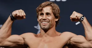 Urijah Faber Smiling And Flexing Wallpaper