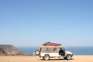 Vacation Surfboard Jeep Wallpaper