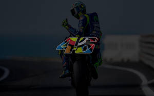 Valentino Rossi In Action, Racing With Number 46 Wallpaper