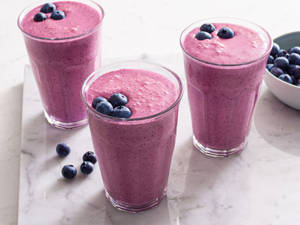 Vibrant Healthy Smoothie Blend Wallpaper