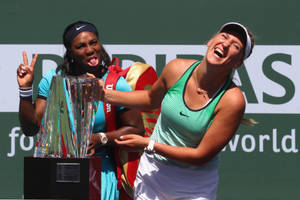 Victory Embrace - Victoria Azarenka And Fellow Player Celebrate Wallpaper