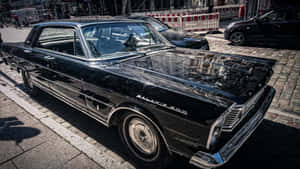 Vintage Black Car Street Scene Wallpaper