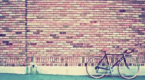 Vintage Desktop Bicycle On Brick Wall Wallpaper
