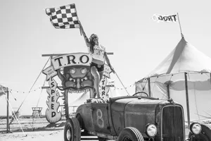 Vintage Flag Girl Holding Checkered Flag Wallpaper