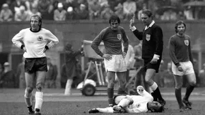 Vintage Football Match Injury Wallpaper