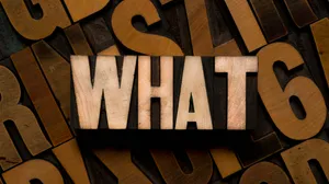 Vintage Print Blocks Spelling W H A T Wallpaper