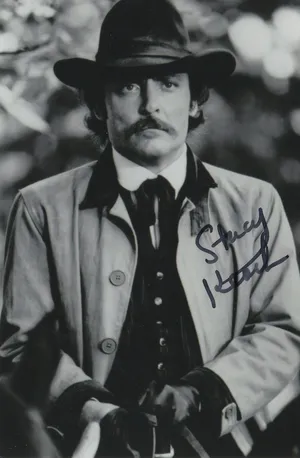 Vintage Styled Man With Hat Autographed Photo Wallpaper