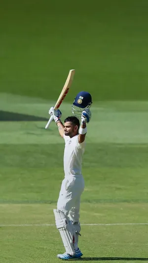 Virat Kohli Hd In Green Field Wallpaper