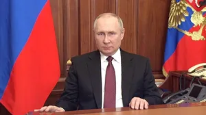 Vladimir Putin Contemplatively Rests Hands On Table Wallpaper