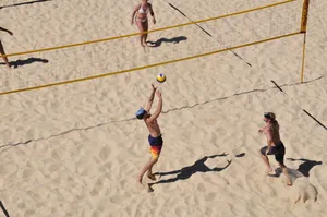 Volleyball Set Up To Teammate Wallpaper