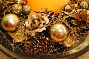 Warm Sparkly Golden Christmas Decorations Adorning A Beautiful Tree. Wallpaper