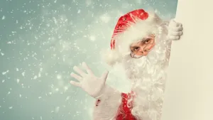 Waving Santa Claus In Snow Wallpaper