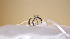 Wedding Ring On A Cushion Wallpaper