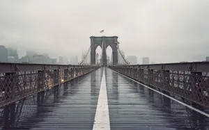 Wet Walkway On The Brooklyn Bridge Wallpaper
