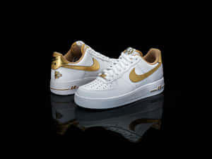 White And Gold Nike Af1 Pair Wallpaper