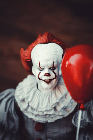 White And Red Clown Holding Heart Balloon Wallpaper