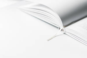White Book Marker On Book Page Wallpaper