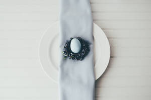 White Egg On Black Plate Wallpaper