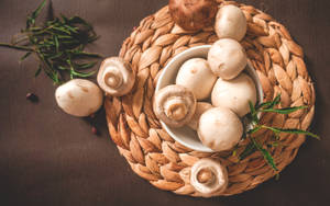 White Garlic On Brown Woven Basket Wallpaper