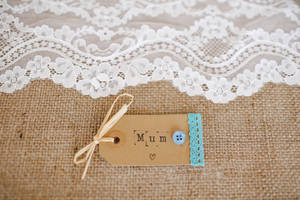 White Lace Cloth Near Mum Tag Wallpaper