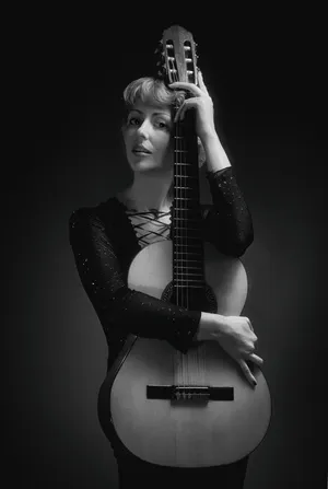White Lady Modeling Guitar Wallpaper