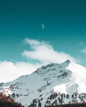White Mountain And Teal Sky Wallpaper