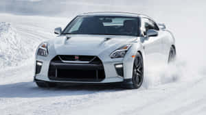 White Nissan R35 Gtr Car Snowy Road Wallpaper