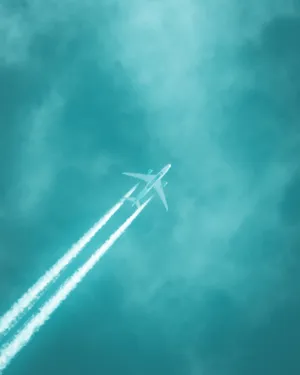 White Plane Flying In The Sky Wallpaper