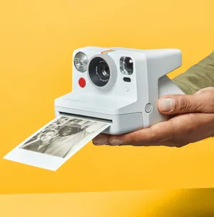 White Polaroid Camera Wallpaper
