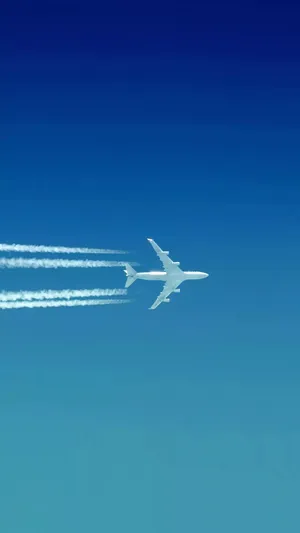 White Trails Of Airplane Iphone Wallpaper