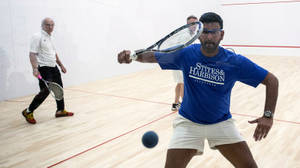 White Versus Blue Racquetball Match Wallpaper