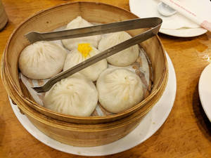 White Xiaolongbao With Metal Tongs Wallpaper