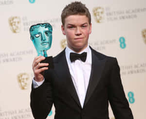 Will Poulter B A F T A Award Winner Wallpaper