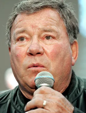 William Shatner Smiling At An Event Wallpaper